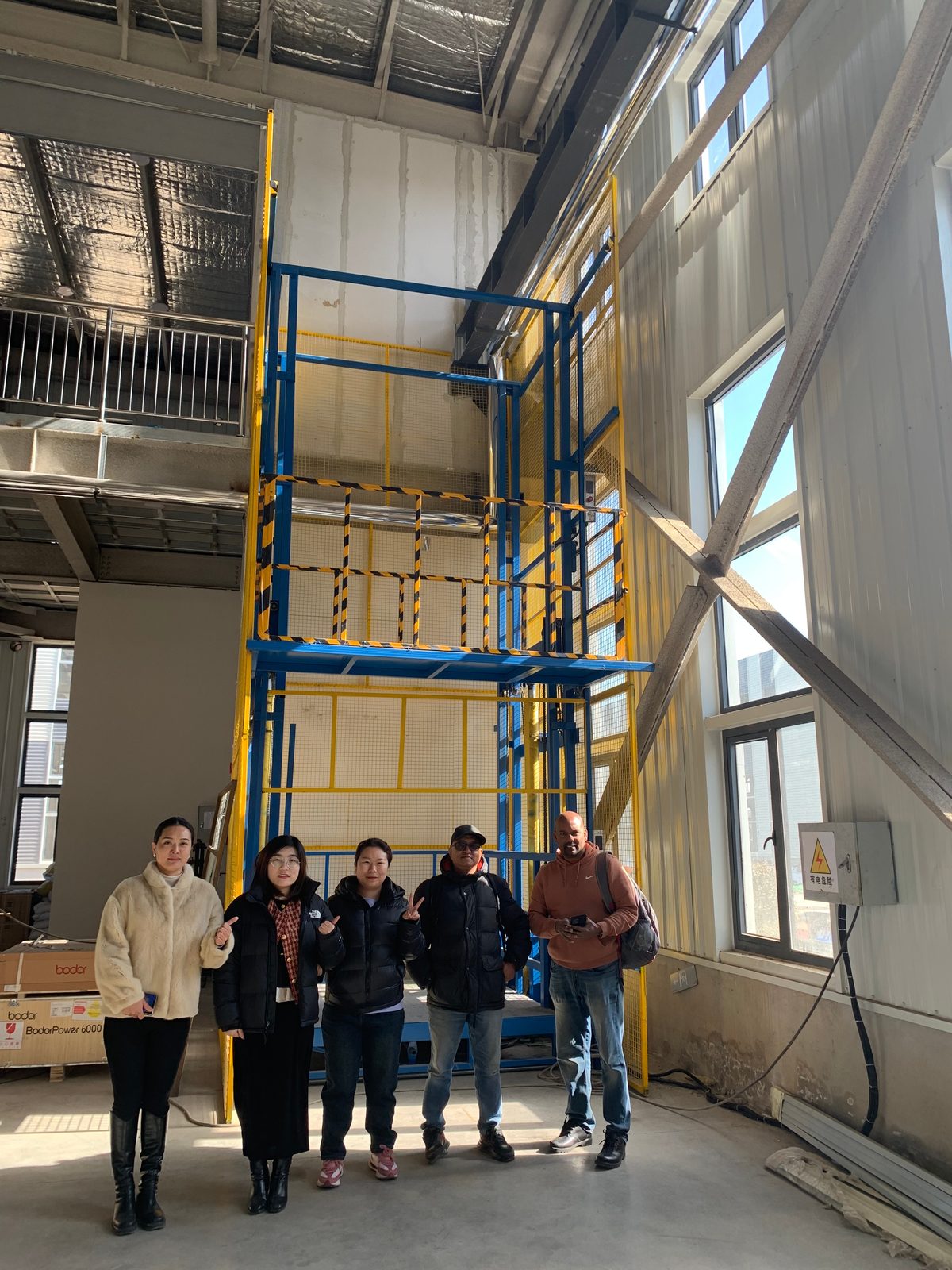 Customers visiting HAOKUN elevator factory