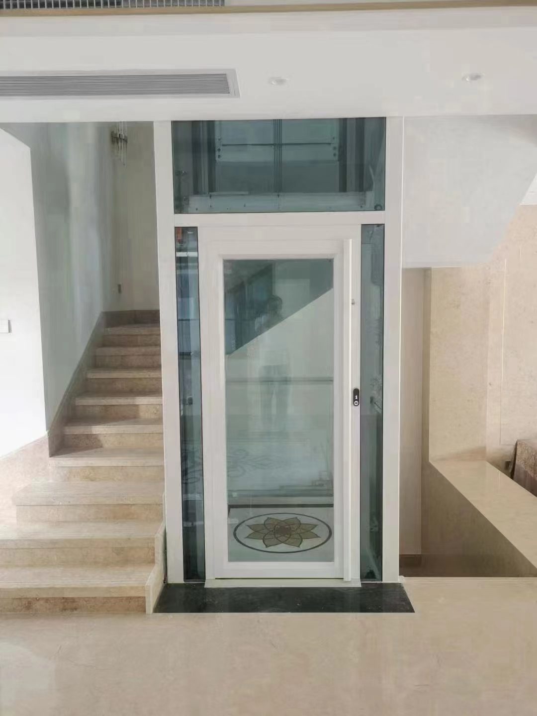 Home elevator installed flush with the floor, no pit required